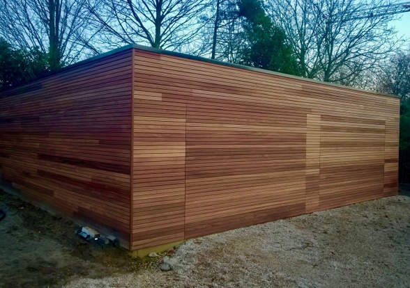 Portes sectionelle aspect bois/alu  - Hörmann - Montré & Laga