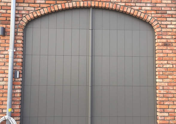 Portes sectionelle aspect bois/alu  - Hörmann - Montré & Laga