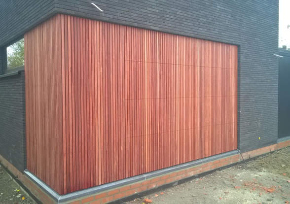 Portes sectionelle aspect bois/alu  - Hörmann - Montré & Laga