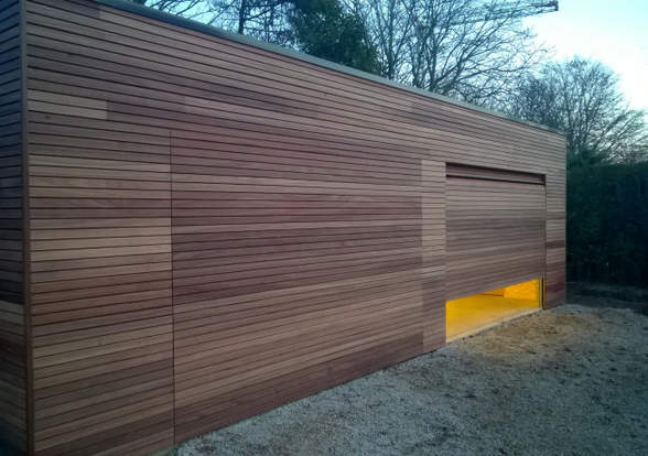 Portes sectionelle aspect bois/alu  - Hörmann - Montré & Laga