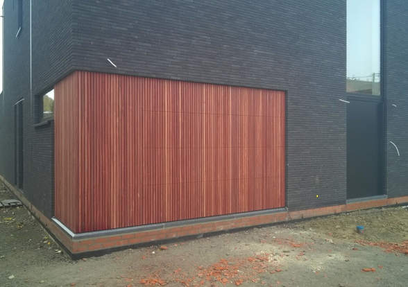 Portes sectionelle aspect bois/alu  - Hörmann - Montré & Laga