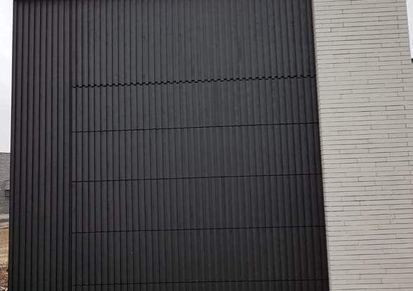 Portes sectionelle aspect bois/alu  - Hörmann - Montré & Laga
