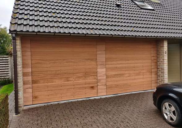 Portes sectionelle aspect bois/alu  - Hörmann - Montré & Laga