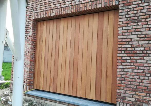 Portes sectionelle aspect bois/alu  - Hörmann - Montré & Laga