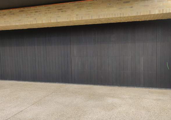 Portes sectionelle aspect bois/alu  - Hörmann - Montré & Laga