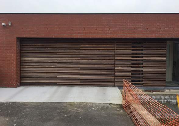 Portes sectionelle aspect bois/alu  - Hörmann - Montré & Laga