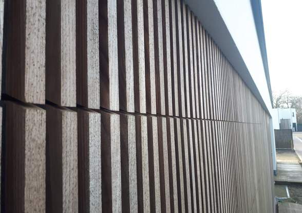 Portes sectionelle aspect bois/alu  - Hörmann - Montré & Laga