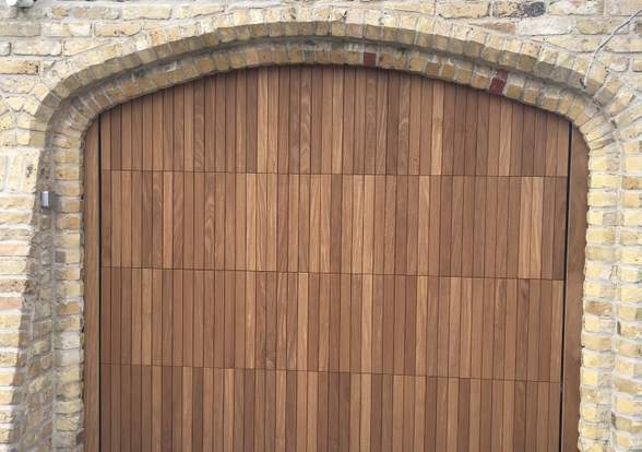 Portes sectionelle aspect bois/alu  - Hörmann - Montré & Laga