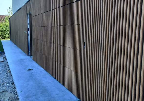 Portes sectionelle aspect bois/alu  - Hörmann - Montré & Laga