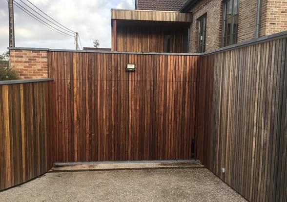 Portes sectionelle aspect bois/alu  - Hörmann - Montré & Laga