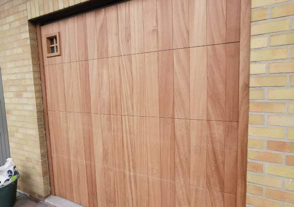 Portes sectionelle aspect bois/alu  - Hörmann - Montré & Laga