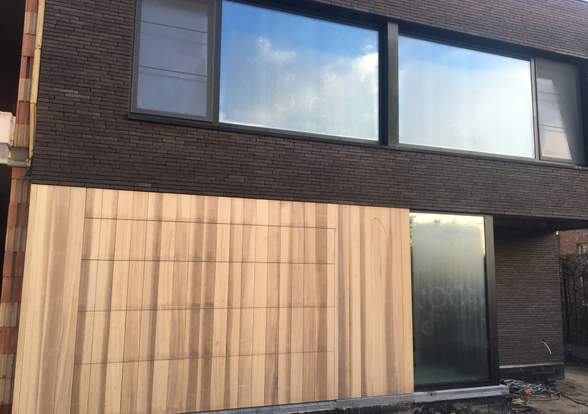 Portes sectionelle aspect bois/alu  - Hörmann - Montré & Laga