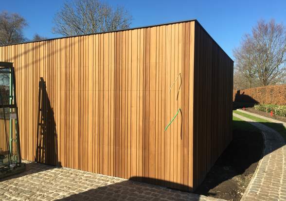 Portes sectionelle aspect bois/alu  - Hörmann - Montré & Laga