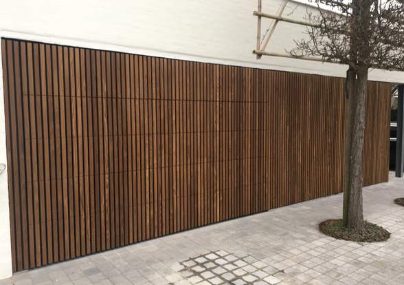 Portes sectionelle aspect bois/alu  - Hörmann - Montré & Laga