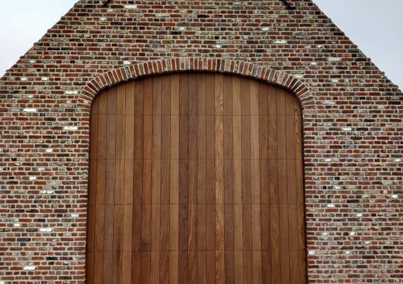 Portes sectionelle aspect bois/alu  - Hörmann - Montré & Laga