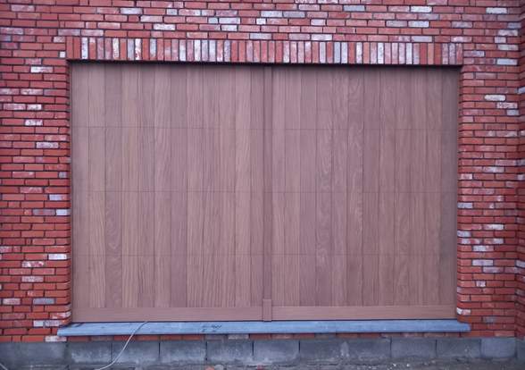 Portes sectionelle aspect bois/alu  - Hörmann - Montré & Laga