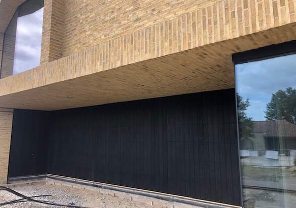 Portes sectionelle aspect bois/alu  - Hörmann - Montré & Laga