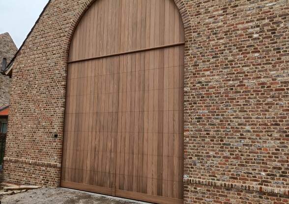 Portes sectionelle aspect bois/alu  - Hörmann - Montré & Laga